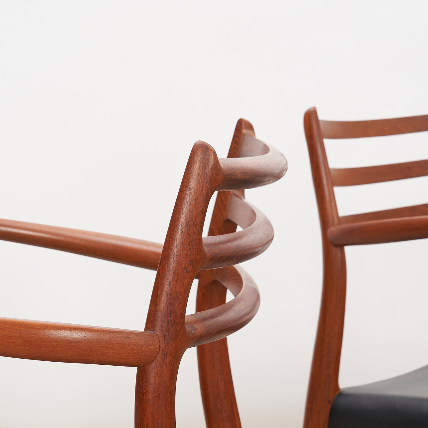 Pair of Teak & Black Leather 'Model 62' Armchairs by Niels O. Møller for J.L. Møller, Denmark