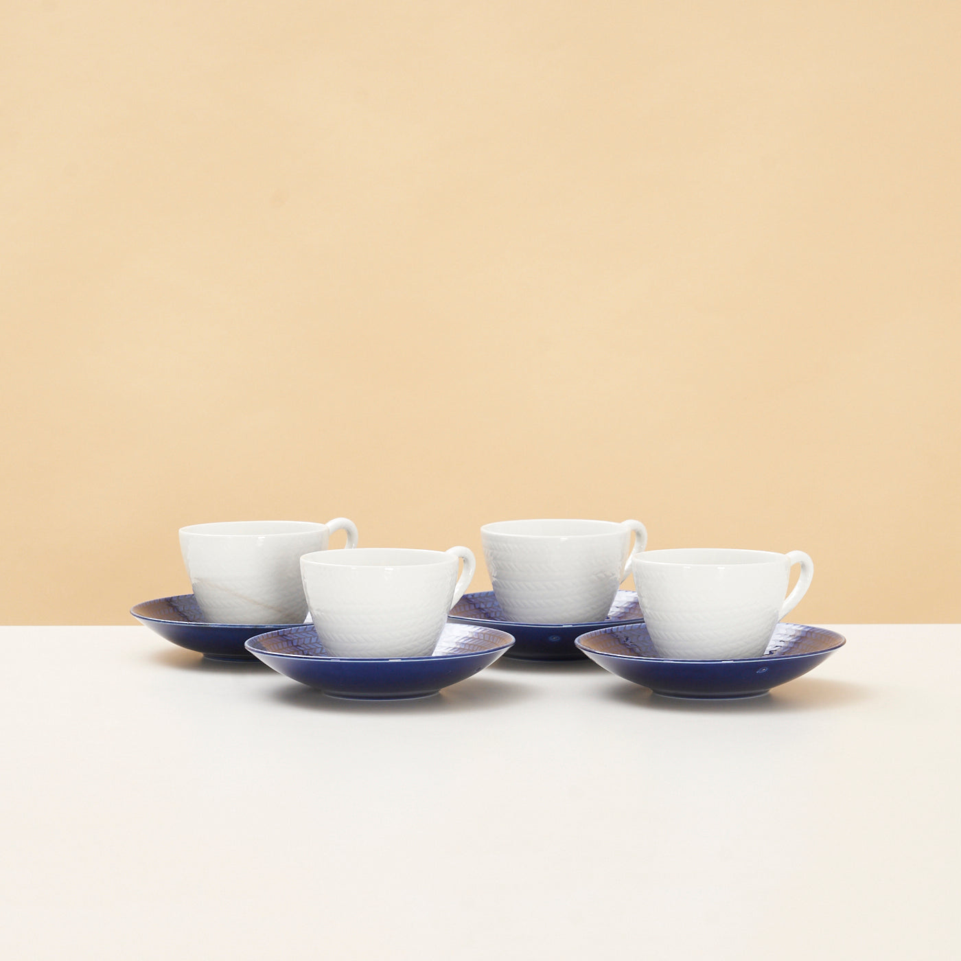 Set of 4 Ceramic 'Blue Fire' Cups & Saucers by Hertha Bengtson for Rörstrand, Sweden