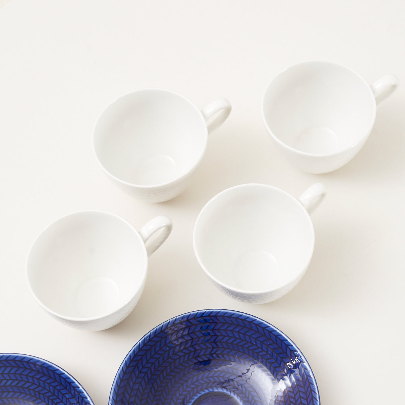 Set of 4 Ceramic 'Blue Fire' Cups & Saucers by Hertha Bengtson for Rörstrand, Sweden