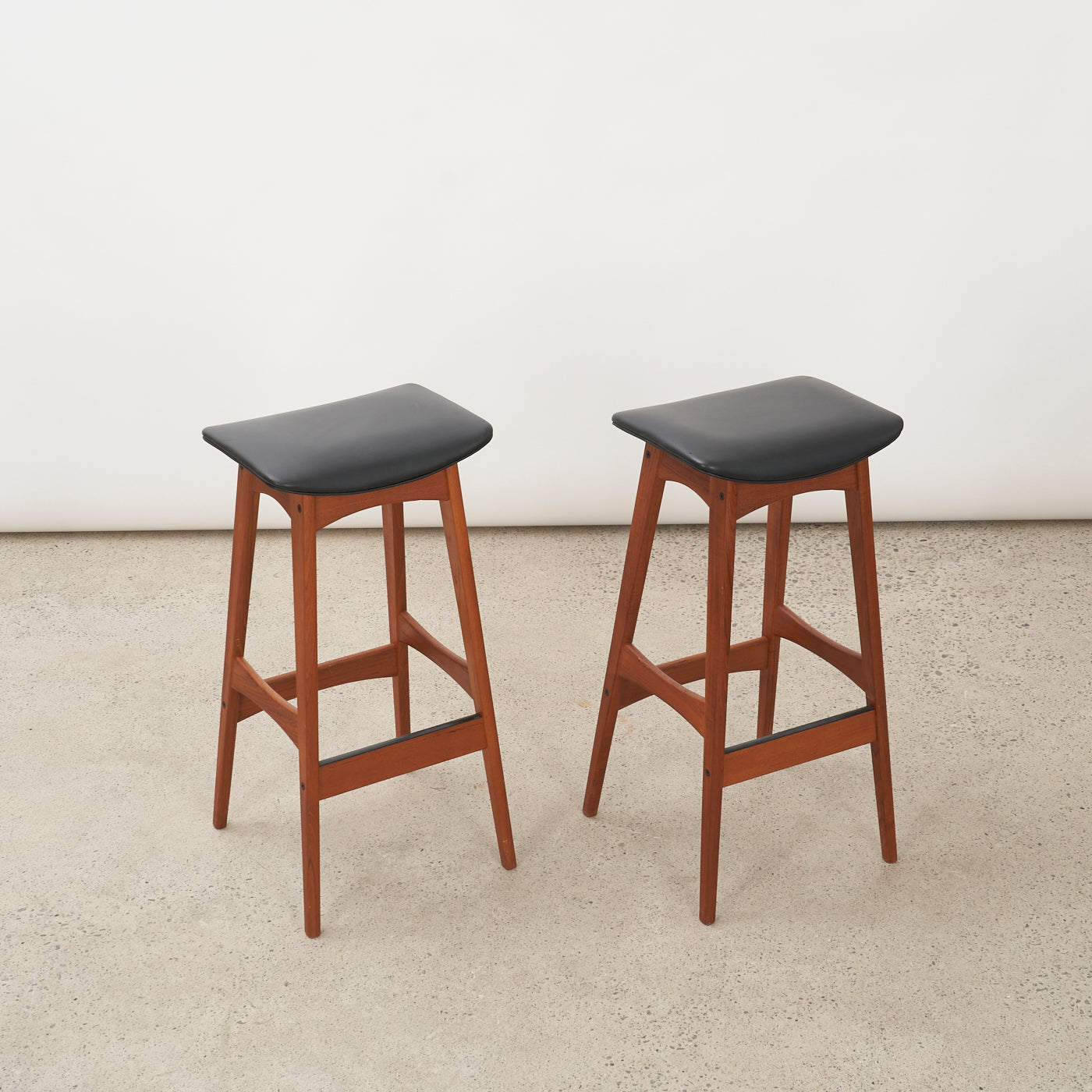 Pair of Teak & Black Vinyl Bar Stools by Johannes Andersen for Brdr. Andersens Møbelfabrik, Denmark