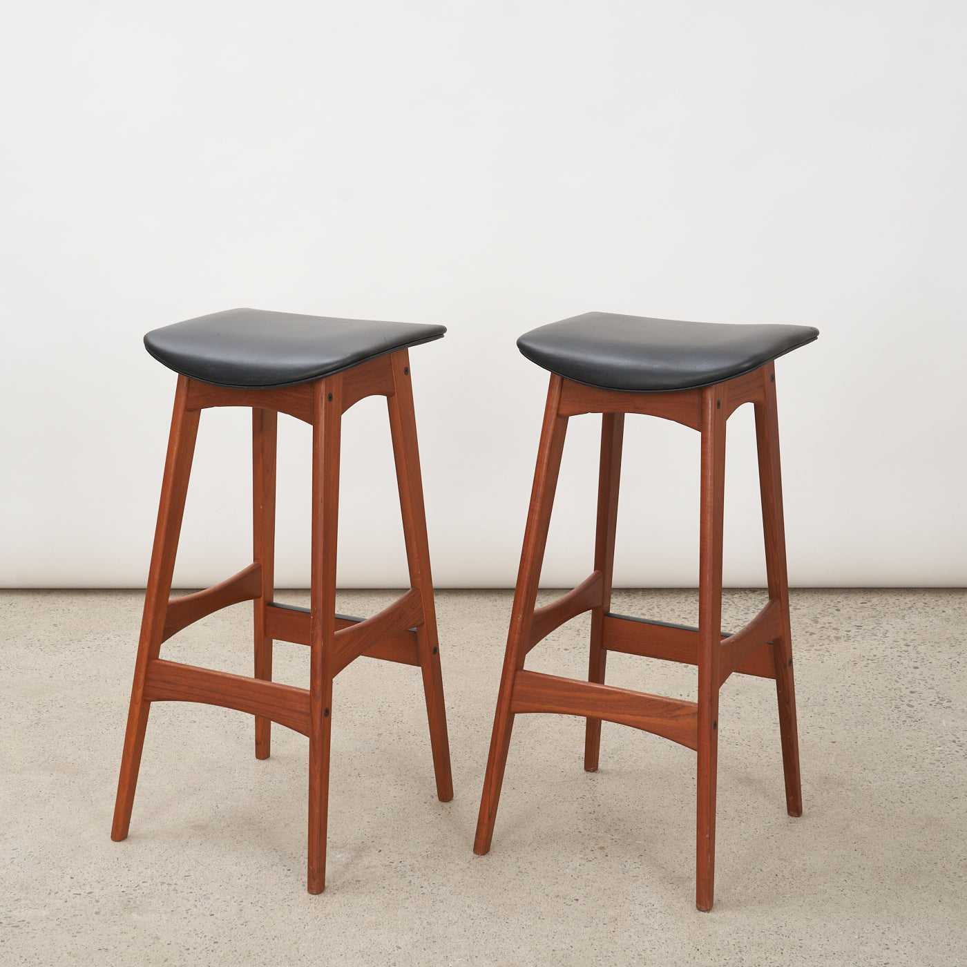 Pair of Teak & Black Vinyl Bar Stools by Johannes Andersen for Brdr. Andersens Møbelfabrik, Denmark