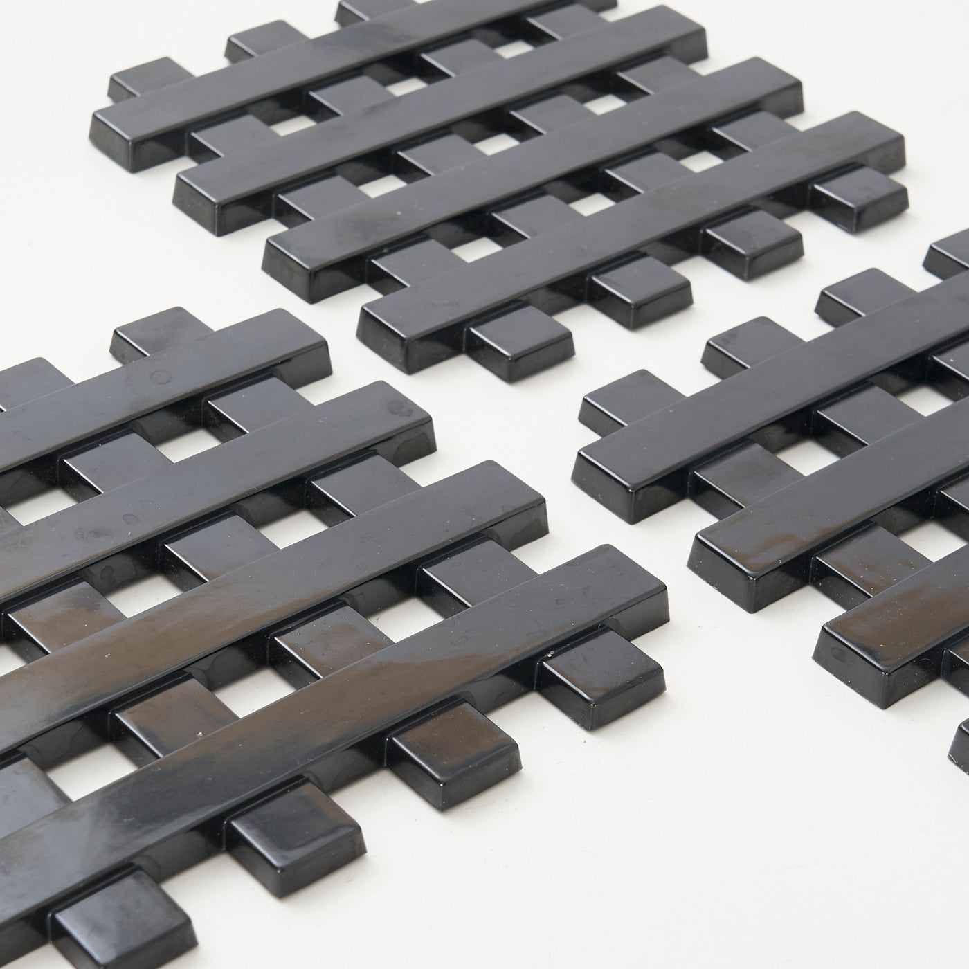 Set of 3 Cross Hatch Plastic Trivets by Copco