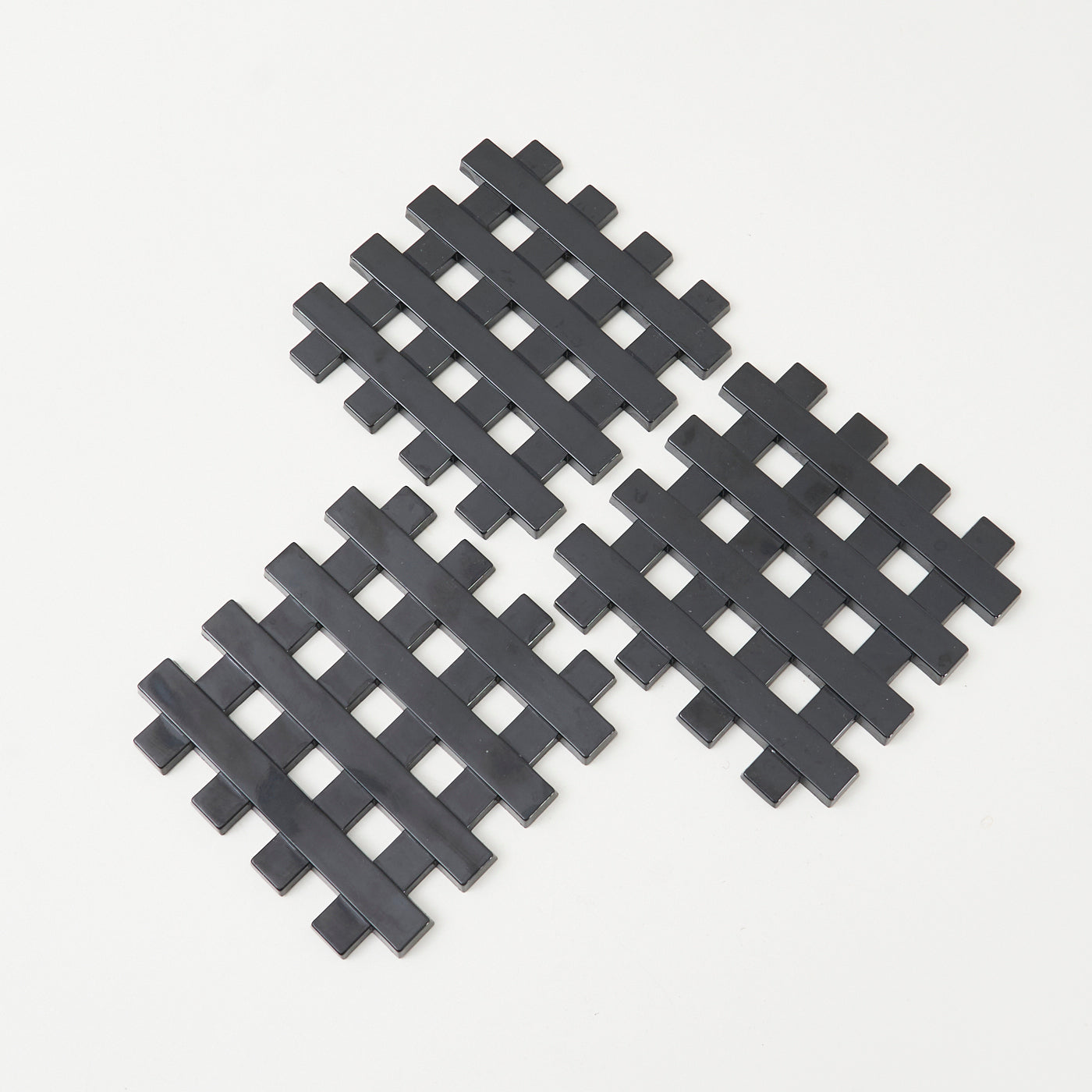 Set of 3 Cross Hatch Plastic Trivets by Copco