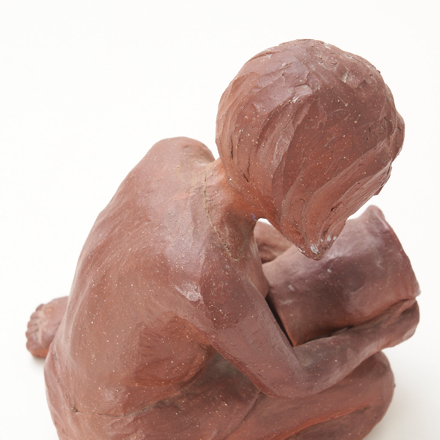 Red Clay Kneeling Child Figurine