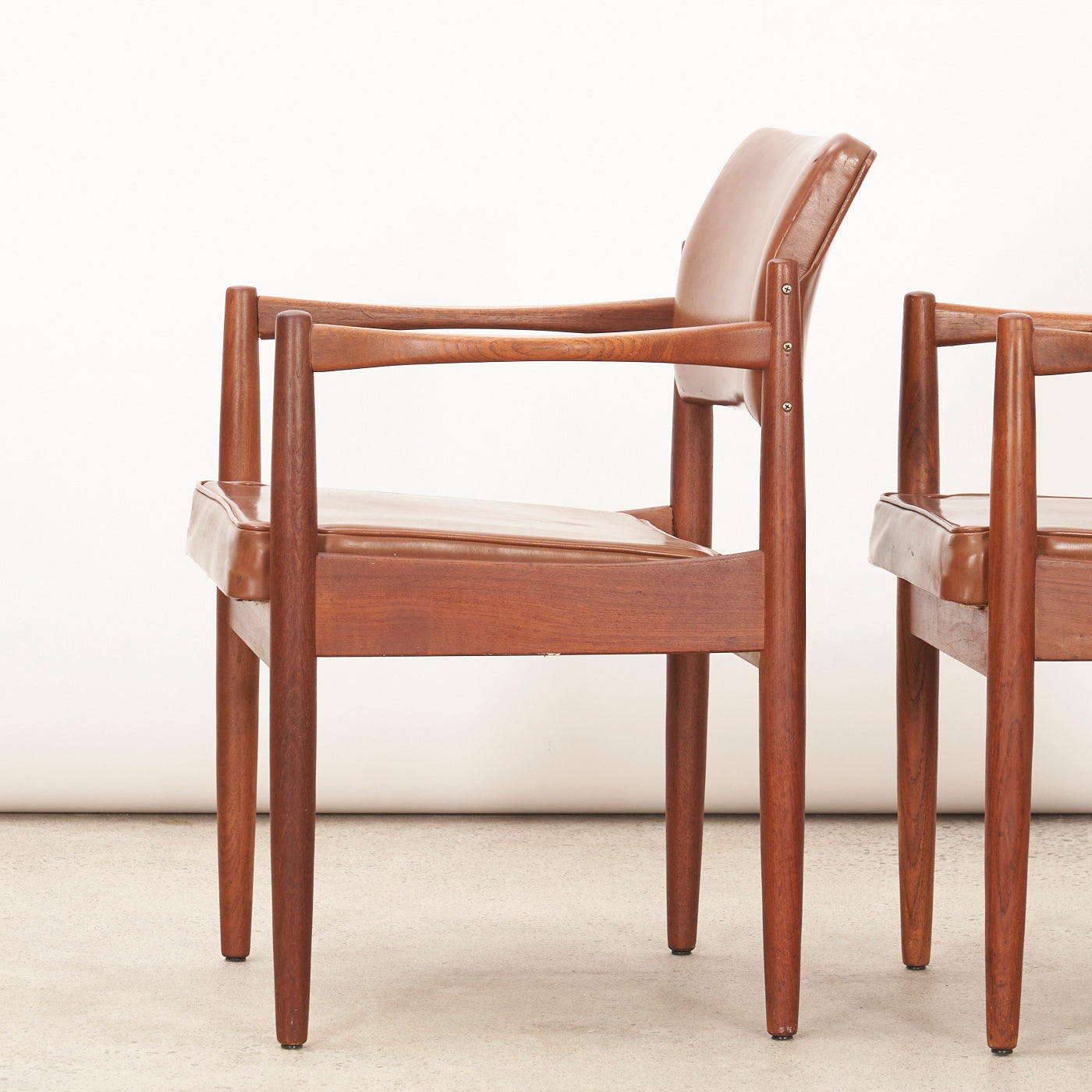 Pair of Teak & Vinyl Arm Chairs