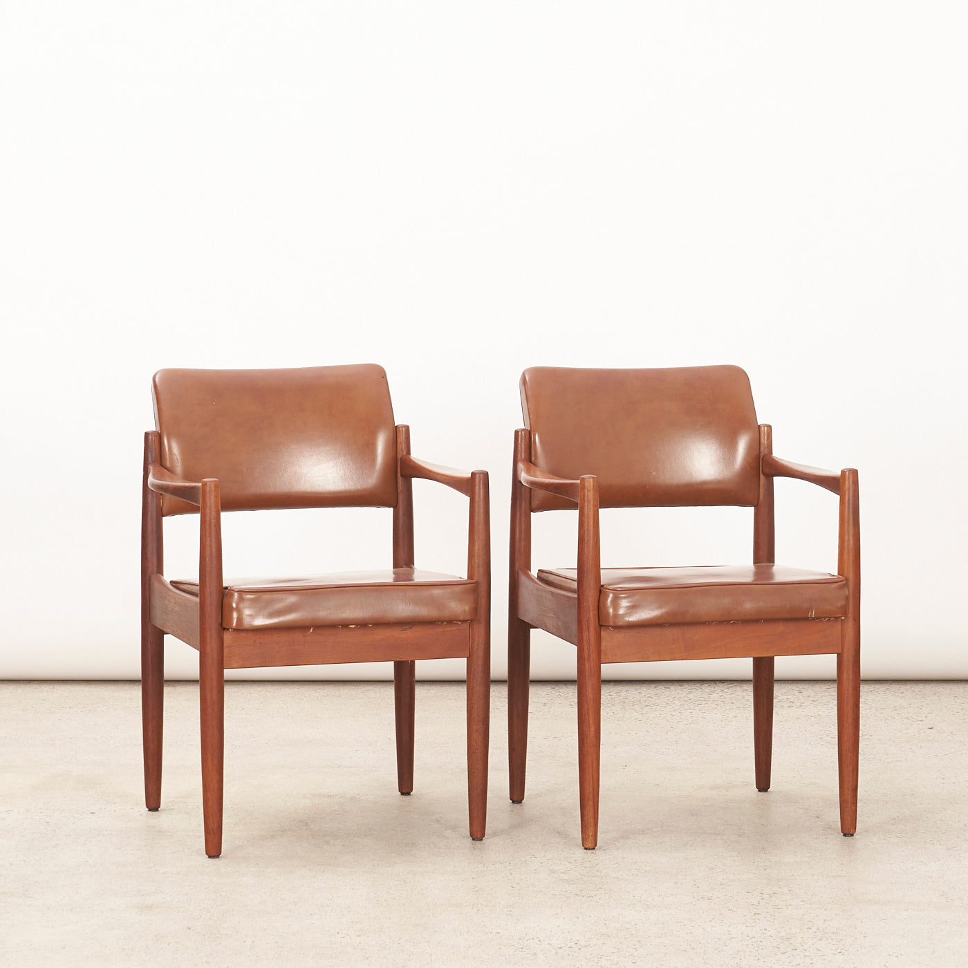 Pair of Teak & Vinyl Arm Chairs