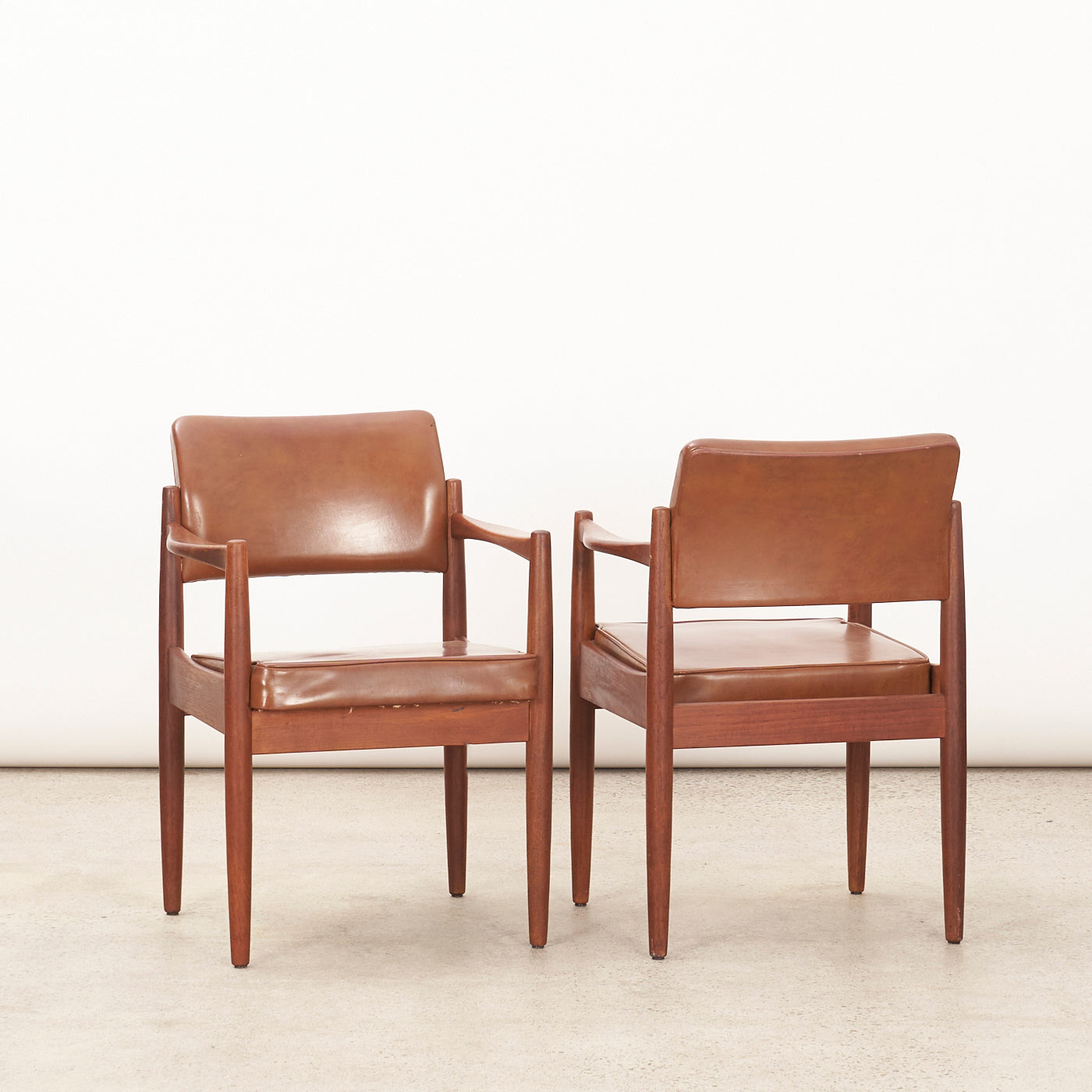 Pair of Teak & Vinyl Arm Chairs