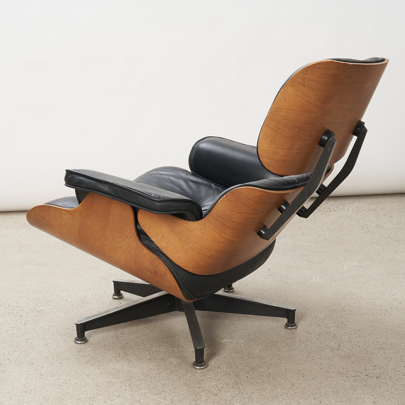 Vintage Eames Black Leather & Walnut Lounge Chair & Ottoman for Herman Miller