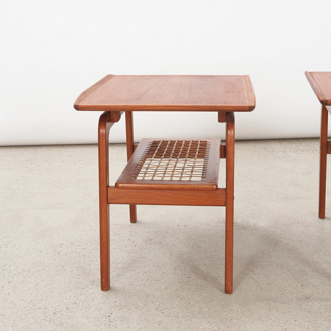 Pair of Teak Side Tables w/ Cane Shelves