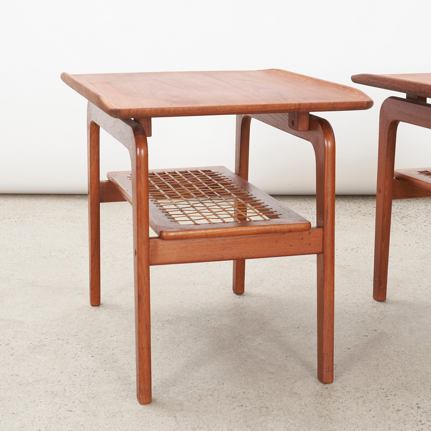 Pair of Teak Side Tables w/ Cane Shelves