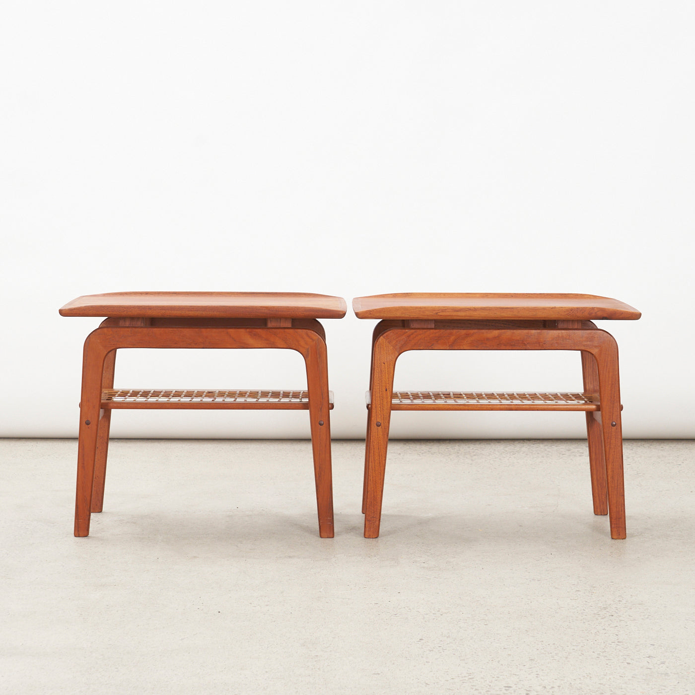Pair of Teak Side Tables w/ Cane Shelves