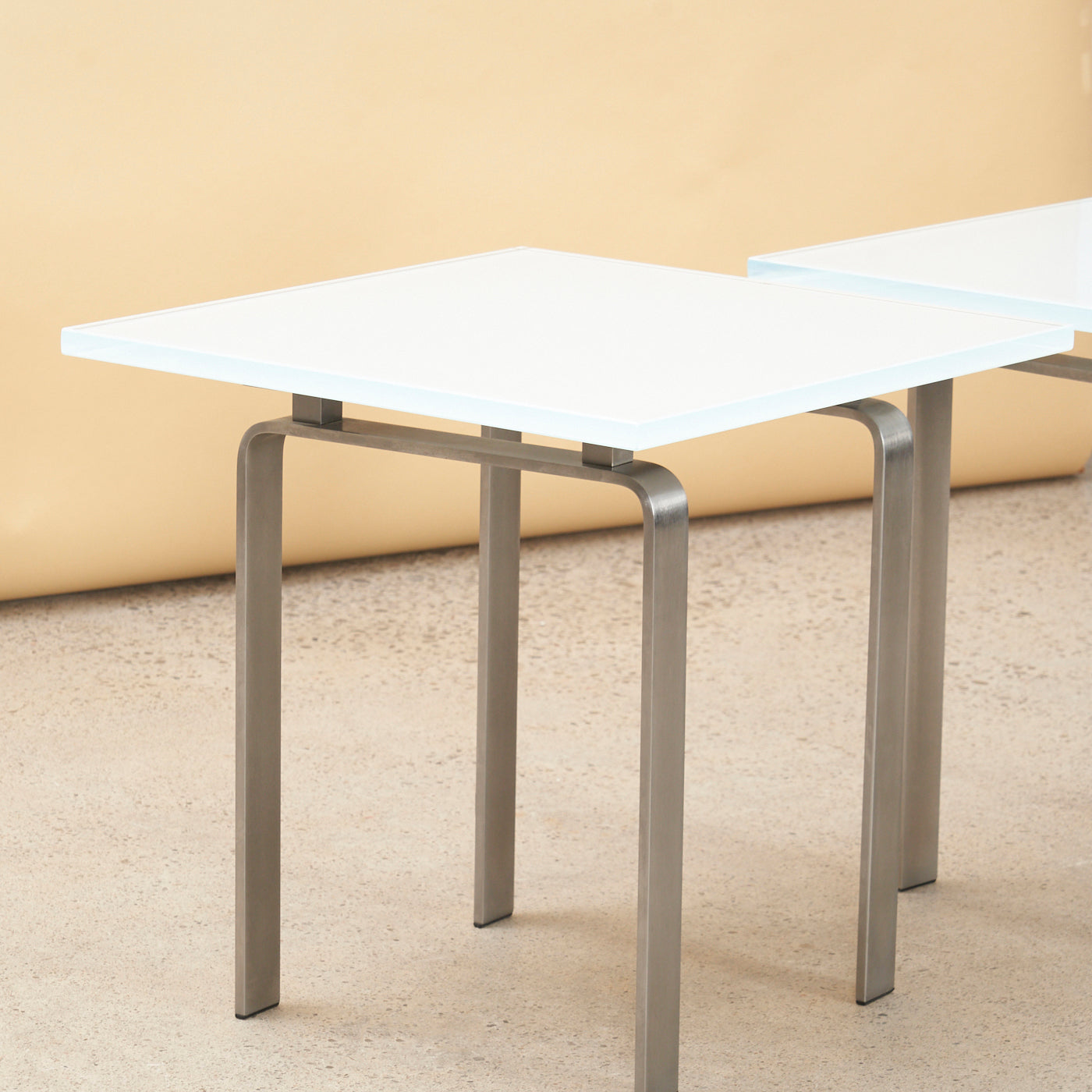 Pair of Glass & Stainless Steel Side Tables
