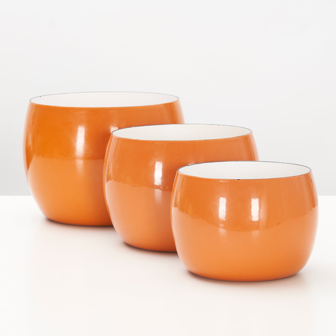 Set of 3 Orange Enamel 'Købenstyle' Bowls by Jens Quistgaard for Dansk