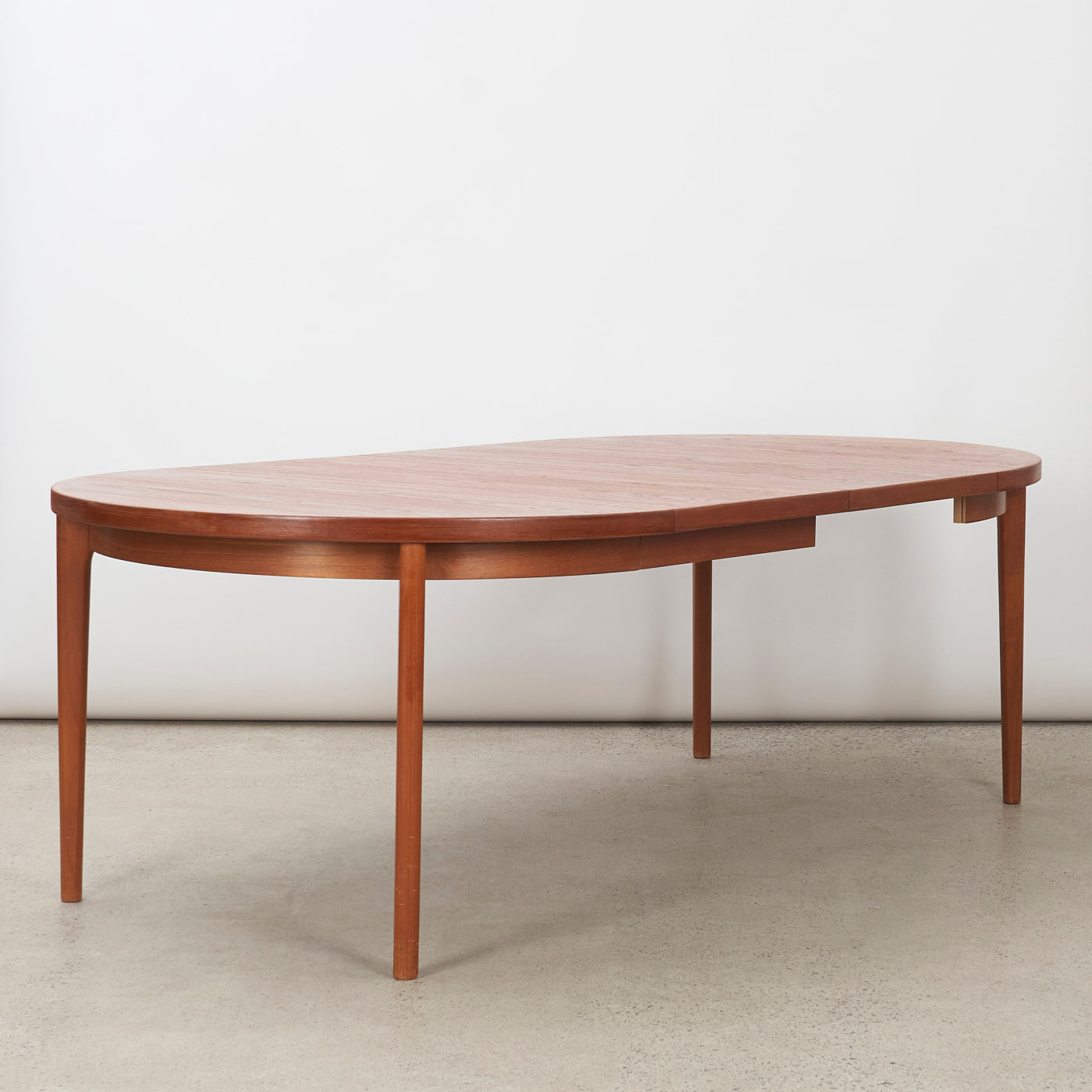 Extendable Round Teak Dining Table