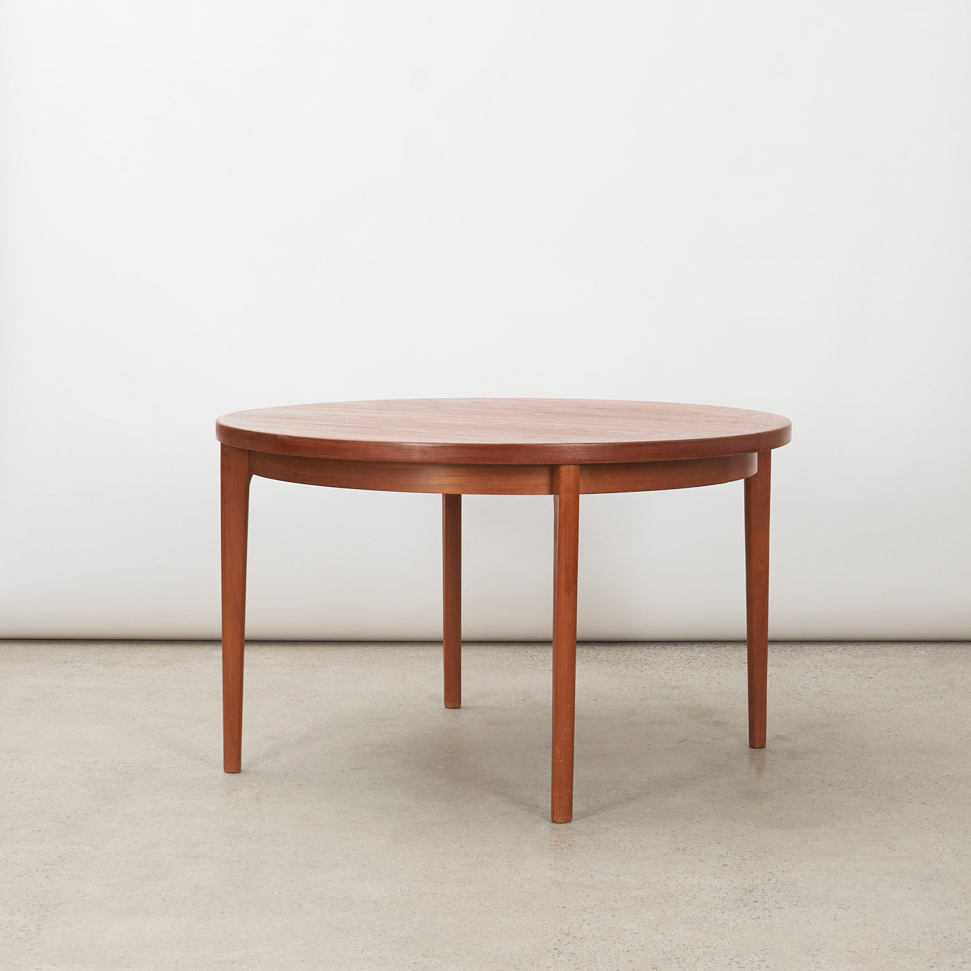 Extendable Round Teak Dining Table