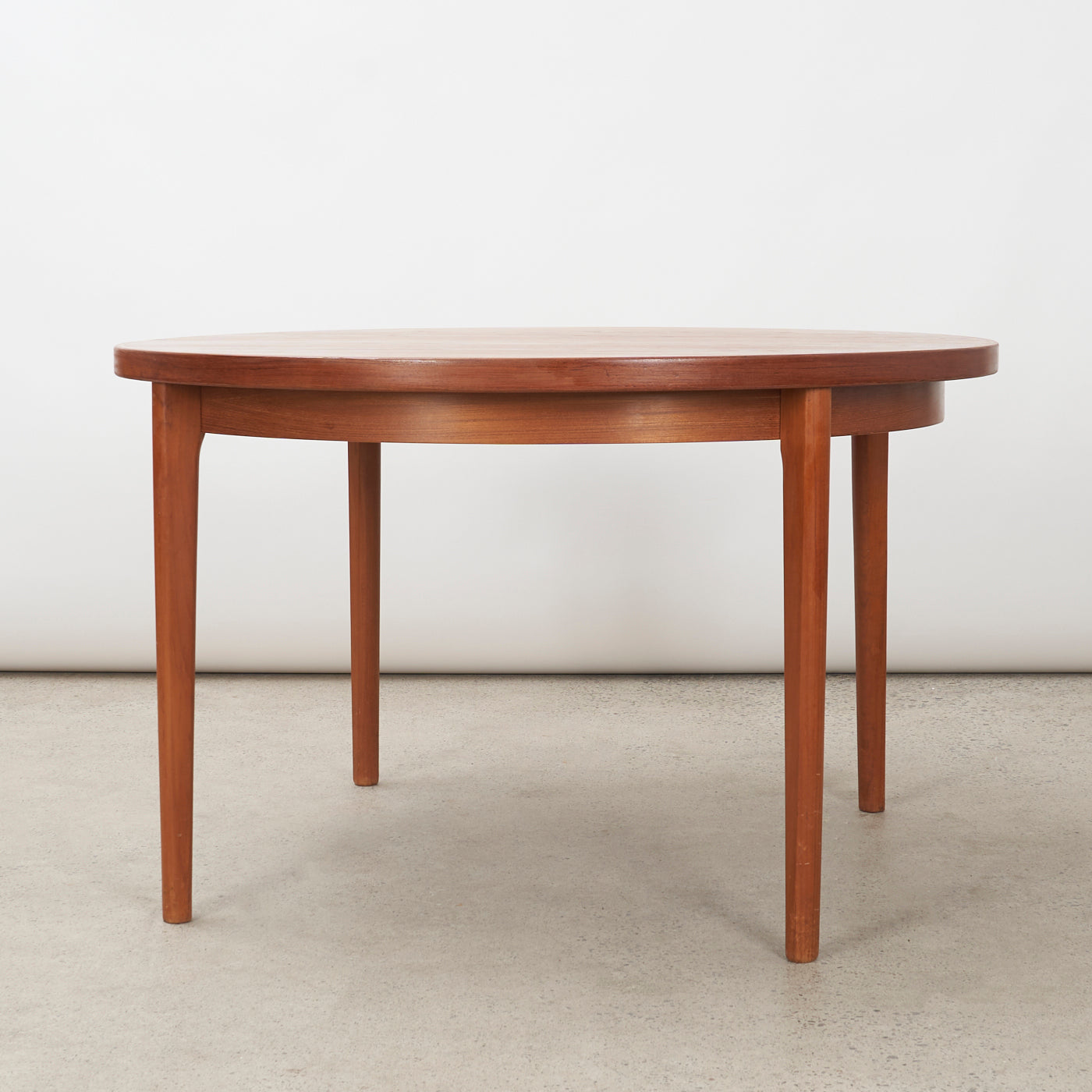 Extendable Round Teak Dining Table