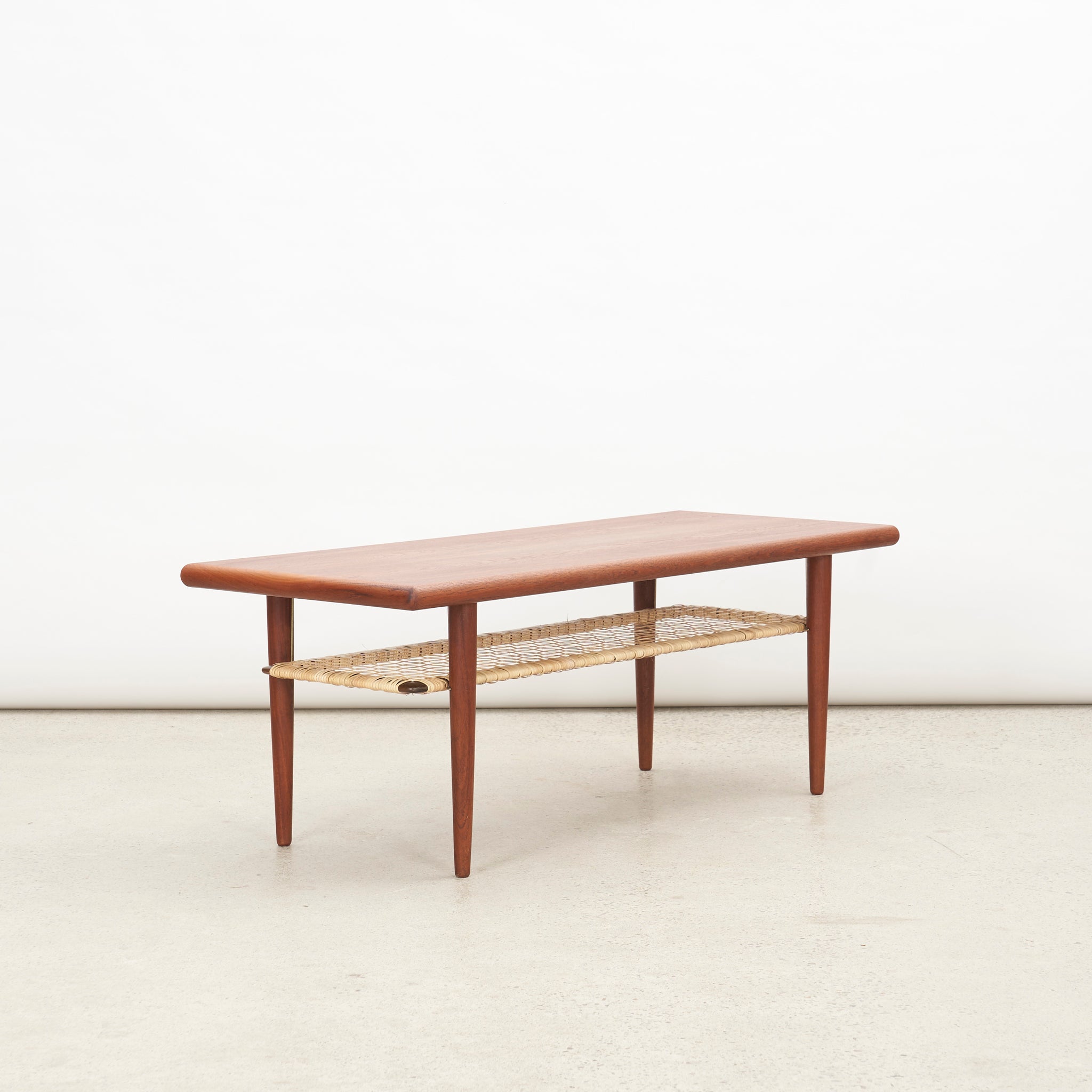 Teak Coffee Table w/ Cane Shelf by Johannes Andersen for Silkeborg