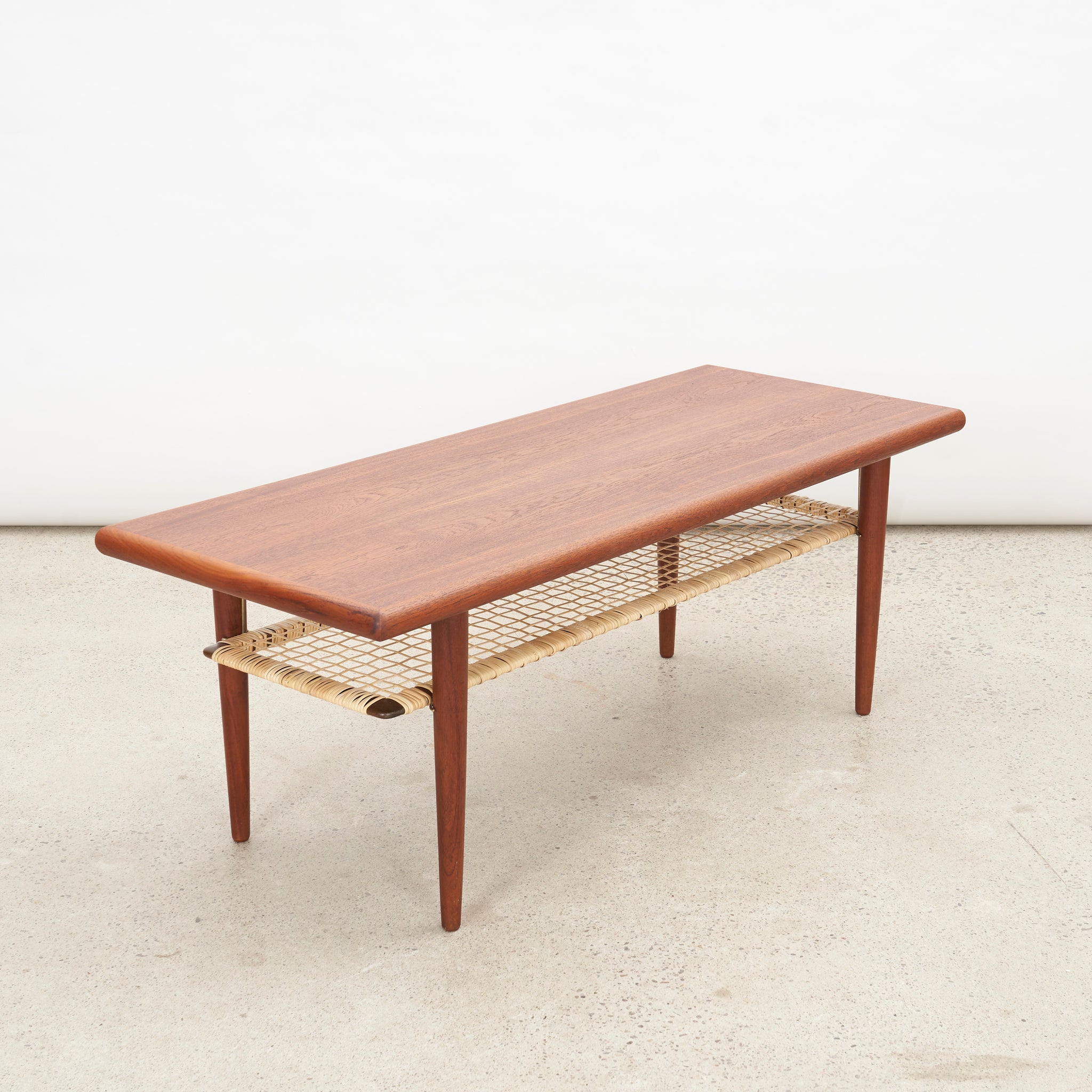 Teak Coffee Table w/ Cane Shelf by Johannes Andersen for Silkeborg