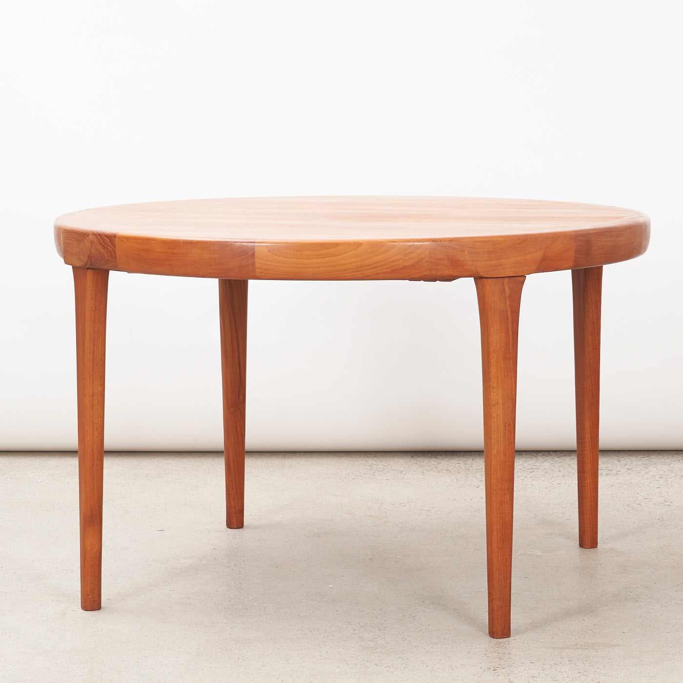 Extendable Round Teak Dining Table