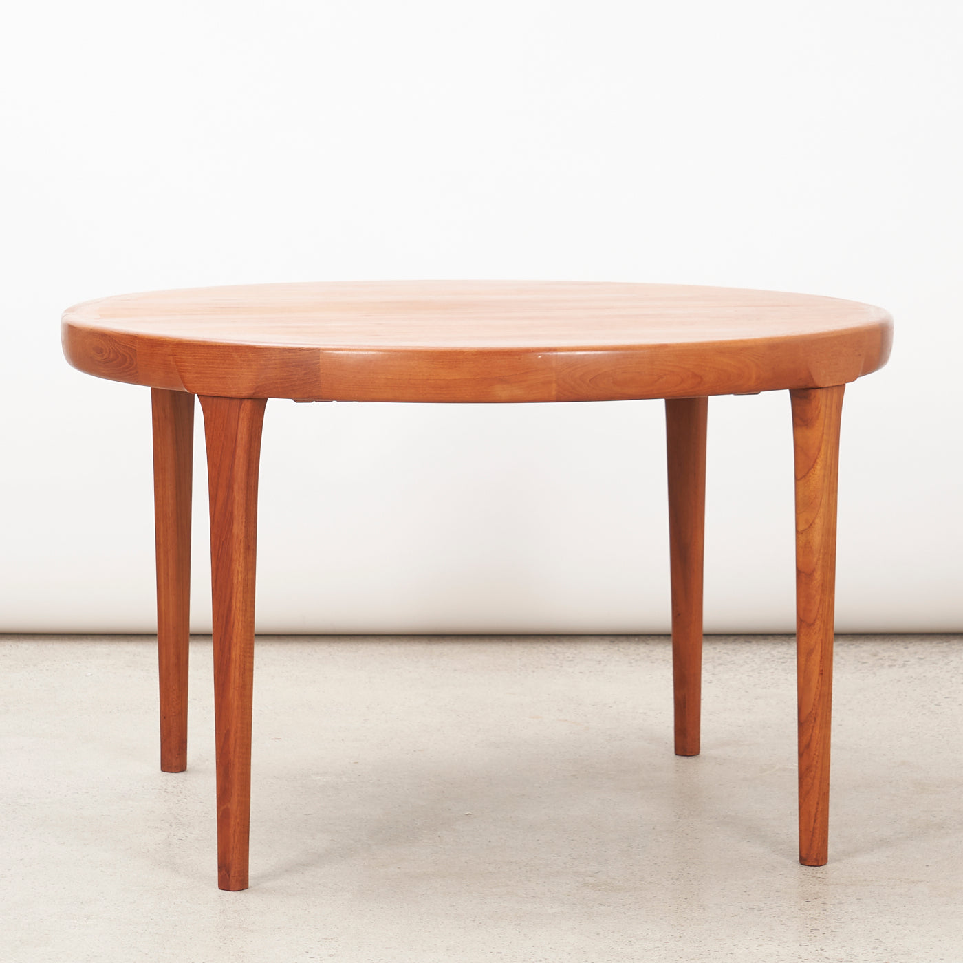 Extendable Round Teak Dining Table